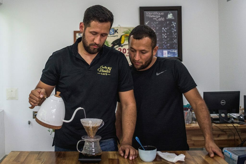 Yonatan and Julian of Cuatro Vientos brewing coffee