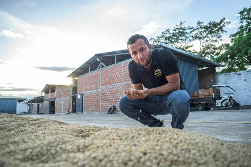 Julian at a Cuatro Vientos drying patio in Campo Alegre