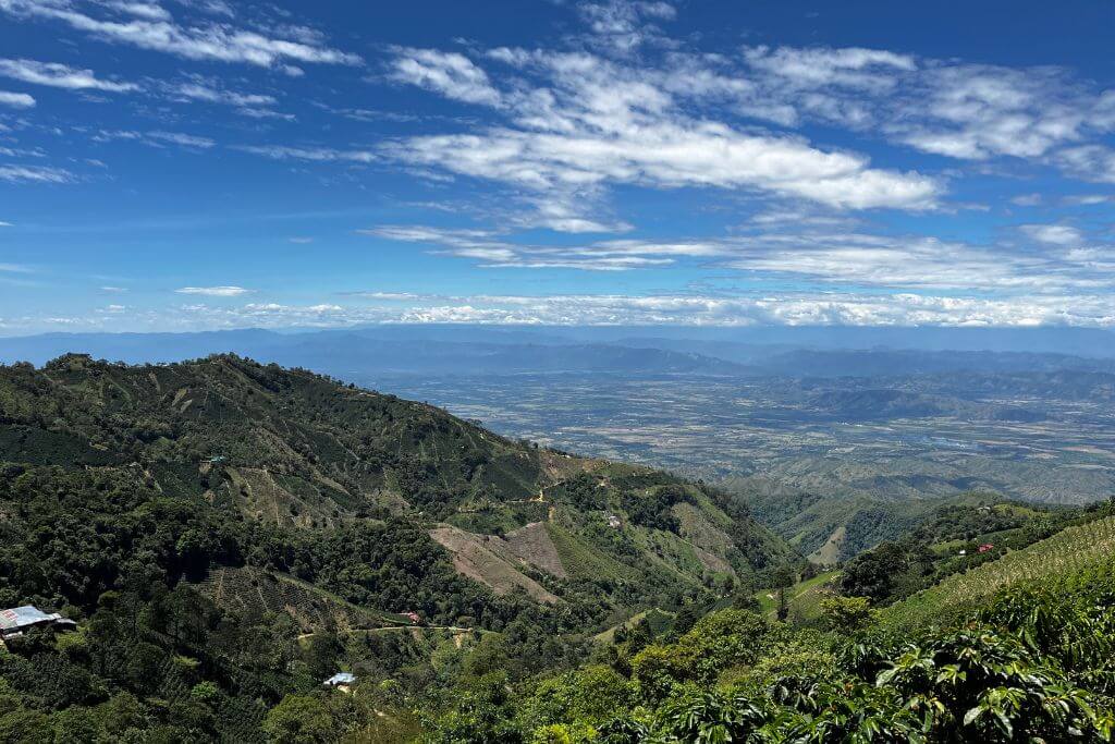 Landscape view from top of mountains overlooking coffee farms in Colombia