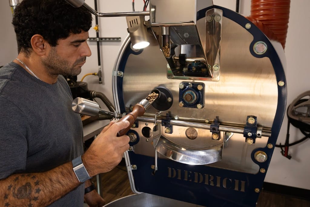 checking coffee while roasting