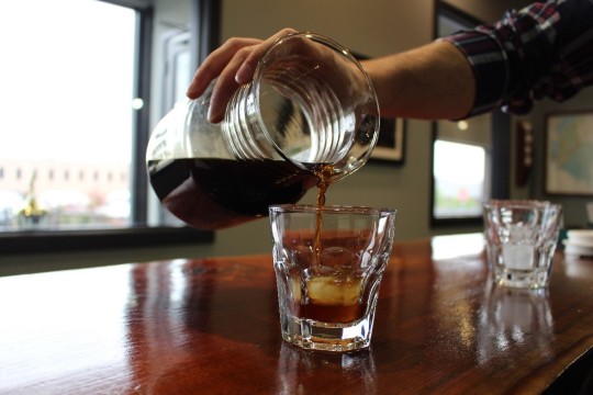 specialty cold brew coffee being poured at Royal New York