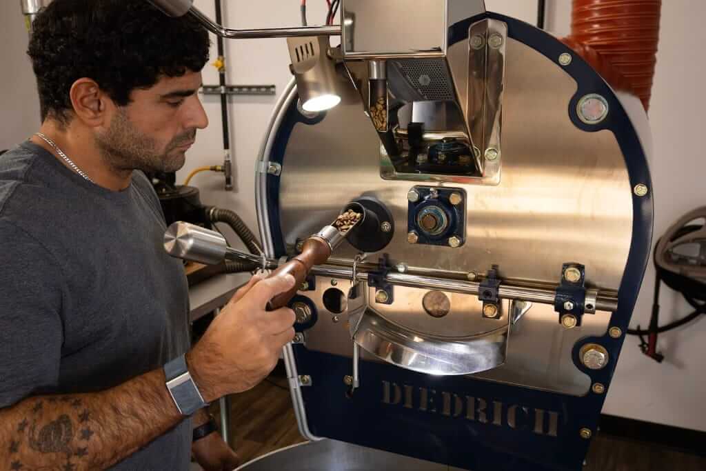 checking coffee while roasting