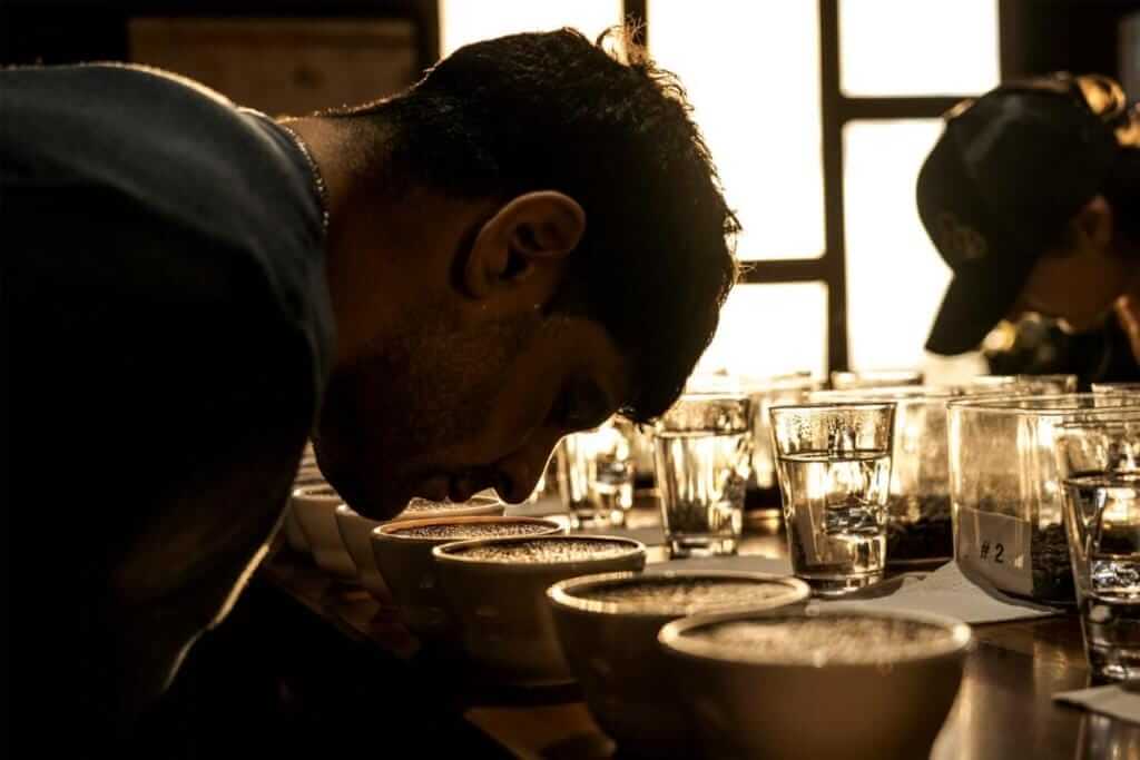 Mike Romagnino beginning a specialty coffee cupping in Costa Rica