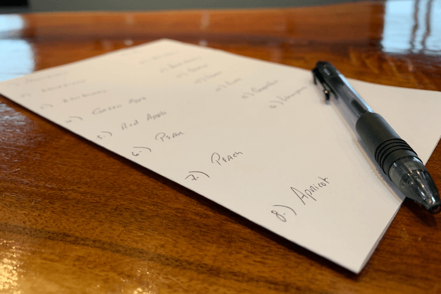 Paper with sensory test answers and pen